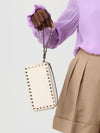 rockstud grained leather clutch