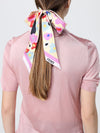 woman's neck scarf