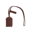 grained leather charm with logo plate